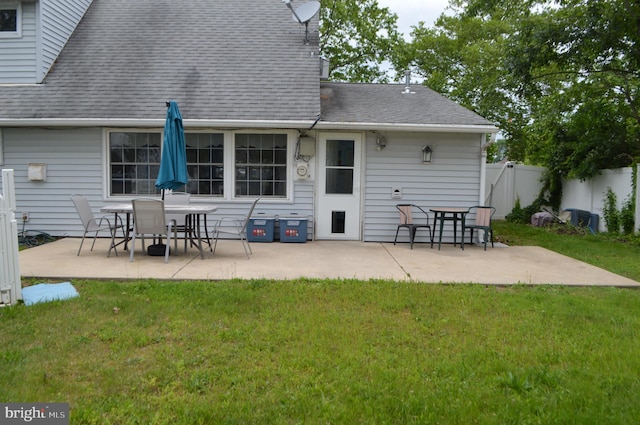 116 Queen Lily Rd, Levittown, PA 19057 - rear view of property with a patio and roof with shingles