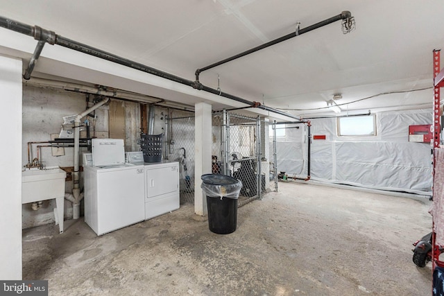 304 Duncan Ave Unit F, Alexandria, VA 22301 - basement featuring washer and clothes dryer and a sink