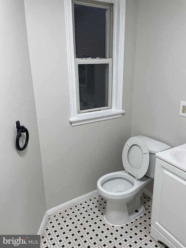 3816 Fairhaven Ave, Baltimore City, MD 21226 - bathroom with toilet, baseboards, vanity, and tile patterned floors