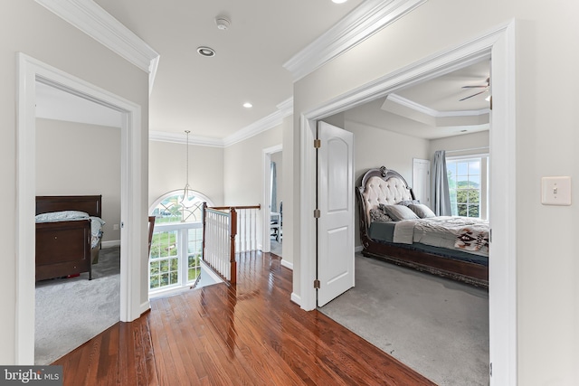131 Pierce Ln, Kennett Square, PA 19348 - hall featuring an upstairs landing, crown molding, baseboards, wood finished floors, and recessed lighting