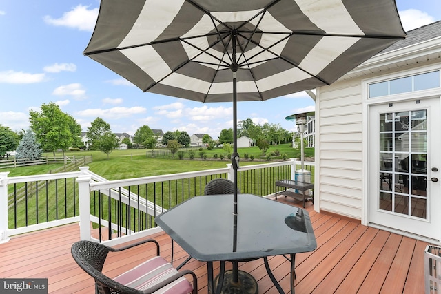 131 Pierce Ln, Kennett Square, PA 19348 - wooden terrace with outdoor dining area and a yard