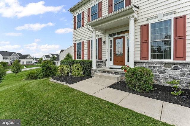 131 Pierce Ln, Kennett Square, PA 19348 - property entrance featuring a lawn, a residential view, and stone siding