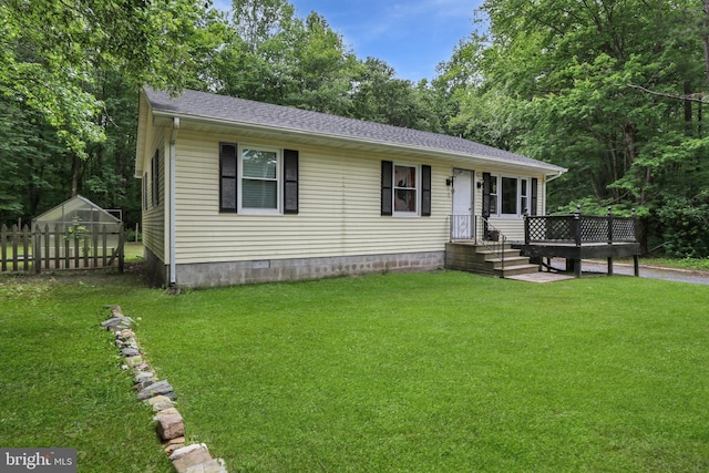 4233 Spire Ct, Snow Hill, MD 21863 - view of front facade featuring a front yard, a shingled roof, and an outdoor structure
