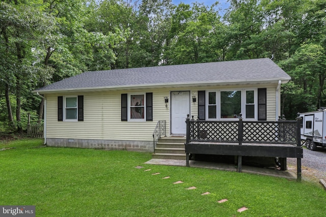 4233 Spire Ct, Snow Hill, MD 21863 - view of front of home with a front lawn, a wooden deck, and a shingled roof
