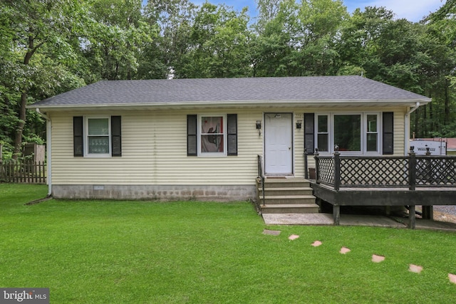 4233 Spire Ct, Snow Hill, MD 21863 - view of front of house featuring a front yard, a shingled roof, a deck, and view of scattered trees