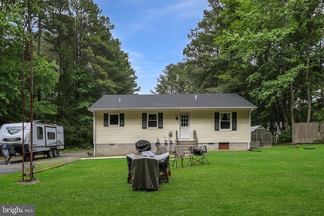 4233 Spire Ct, Snow Hill, MD 21863 - back of house with crawl space, a greenhouse, an outbuilding, a shingled roof, and entry steps