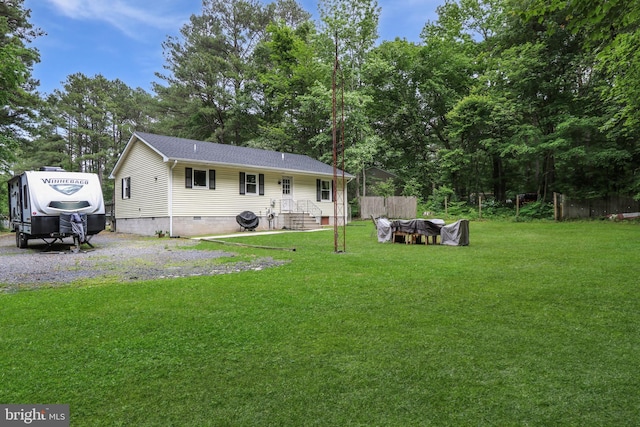 4233 Spire Ct, Snow Hill, MD 21863 - back of property featuring crawl space, a shingled roof, and view of scattered trees