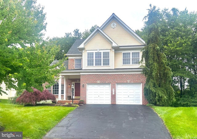 2121 Chaucer Way, Woodstock, MD 21163 - traditional home featuring an attached garage, driveway, a front lawn, and brick siding