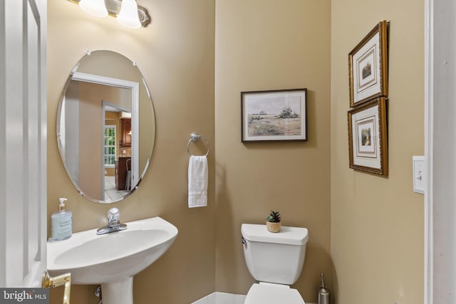 2121 Chaucer Way, Woodstock, MD 21163 - bathroom featuring a sink and toilet