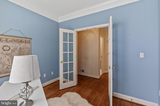2121 Chaucer Way, Woodstock, MD 21163 - office with wood finished floors, ornamental molding, baseboards, and french doors