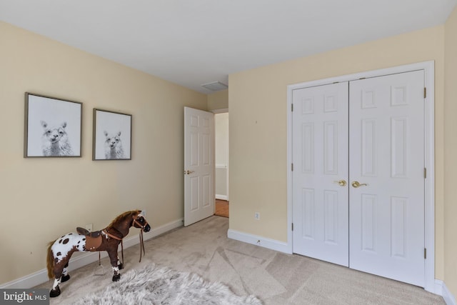 2121 Chaucer Way, Woodstock, MD 21163 - carpeted bedroom featuring baseboards and a closet