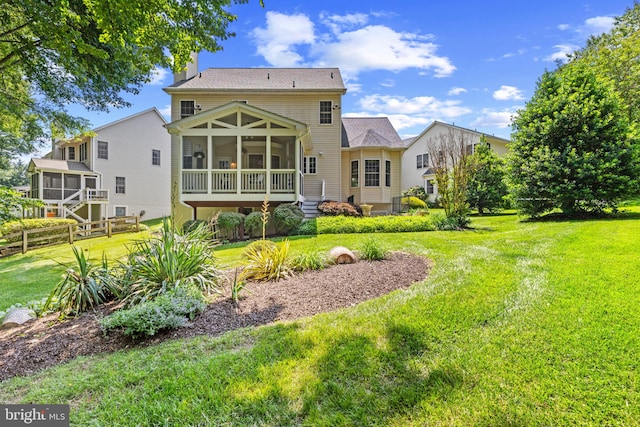 2121 Chaucer Way, Woodstock, MD 21163 - back of property with a sunroom and a chimney