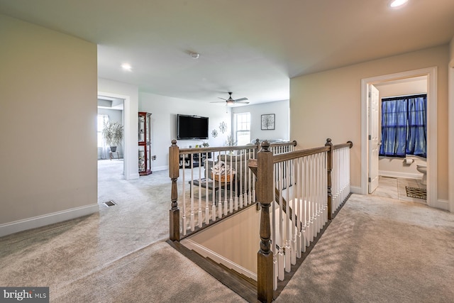 311 Ironstone Ln, Elverson, PA 19520 - hallway with an upstairs landing, carpet, baseboards, and recessed lighting