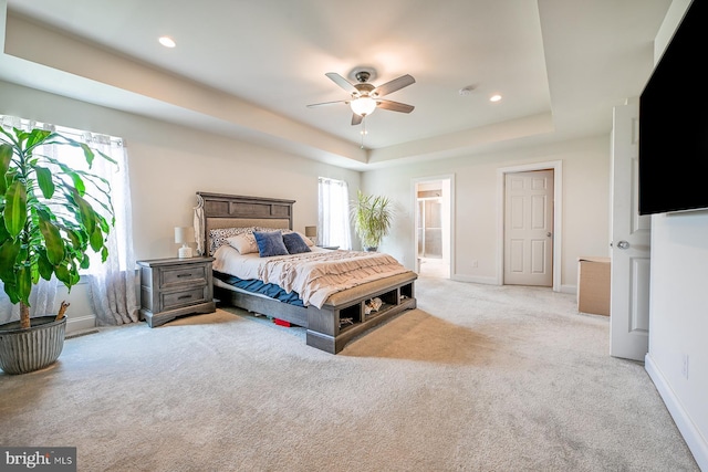 311 Ironstone Ln, Elverson, PA 19520 - carpeted bedroom with baseboards, a raised ceiling, recessed lighting, and ensuite bathroom