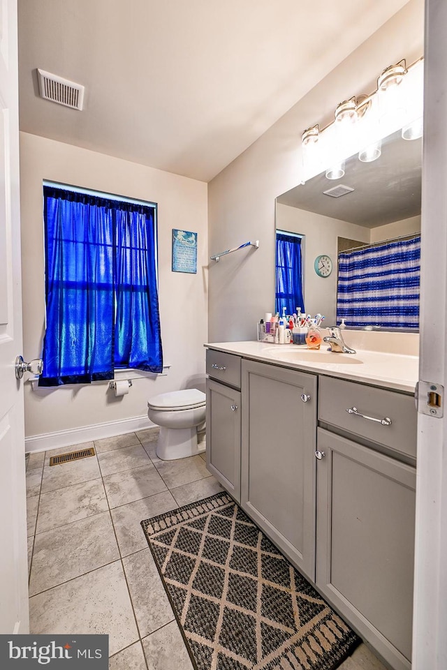 311 Ironstone Ln, Elverson, PA 19520 - bathroom featuring vanity, tile patterned floors, and toilet