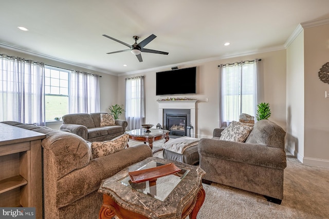 311 Ironstone Ln, Elverson, PA 19520 - carpeted living room featuring ceiling fan, a glass covered fireplace, ornamental molding, baseboards, and recessed lighting
