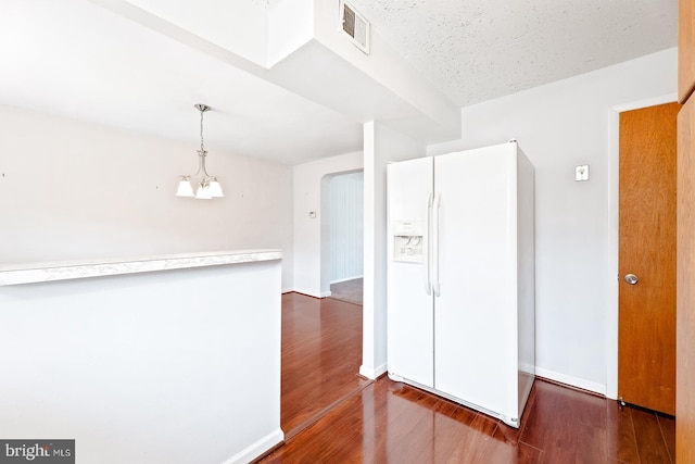 7155 Erdrick St, Philadelphia, PA 19135 - empty room with dark wood-style flooring and baseboards