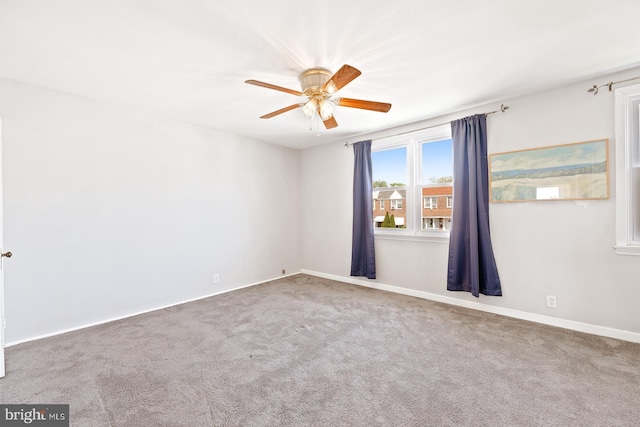 7155 Erdrick St, Philadelphia, PA 19135 - spare room featuring ceiling fan, carpet flooring, and baseboards