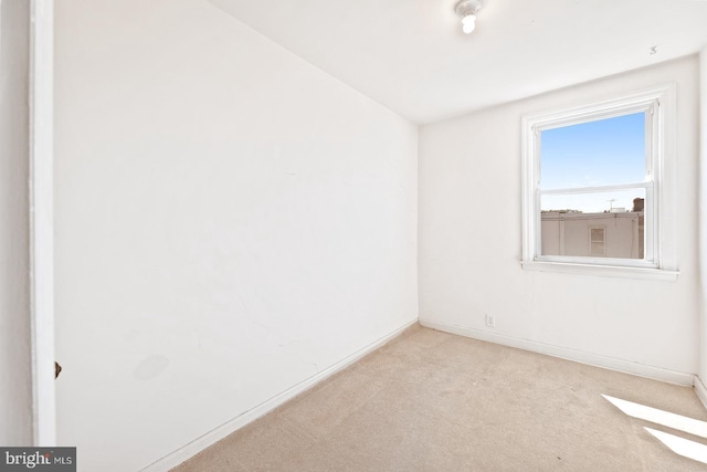 7155 Erdrick St, Philadelphia, PA 19135 - spare room with carpet flooring and baseboards