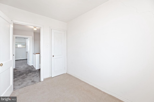 7155 Erdrick St, Philadelphia, PA 19135 - carpeted empty room featuring baseboards