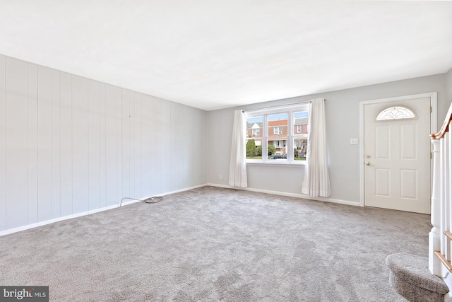 7155 Erdrick St, Philadelphia, PA 19135 - carpeted entrance foyer with baseboards and stairs