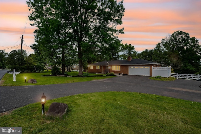 2460 Mill Rd, Quakertown, PA 18951 - ranch-style house with an attached garage, driveway, and a chimney