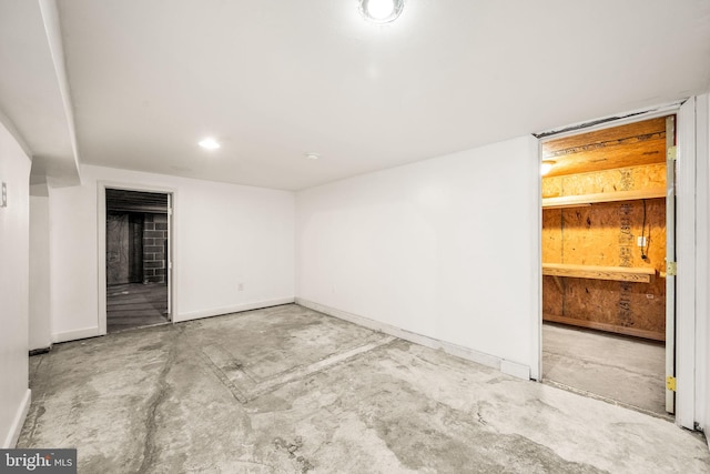 2460 Mill Rd, Quakertown, PA 18951 - empty room with unfinished concrete flooring and baseboards