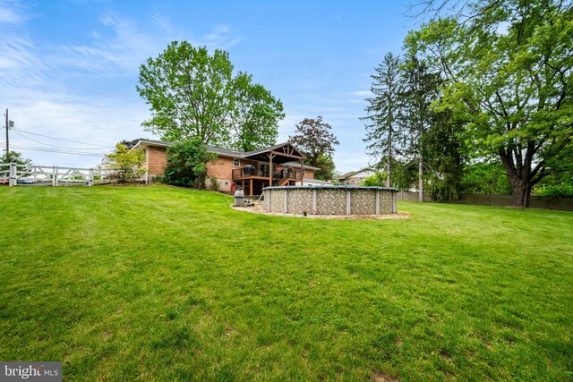2460 Mill Rd, Quakertown, PA 18951 - view of yard with an outdoor pool and a wooden deck