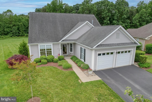 636 Poets Way, Middletown, DE 19709 - view of front of property featuring an attached garage, driveway, a front lawn, and a shingled roof