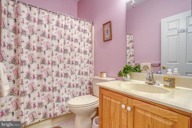 636 Poets Way, Middletown, DE 19709 - bathroom featuring vanity, toilet, tile patterned flooring, and curtained shower