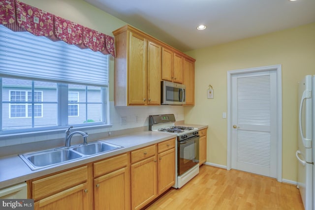 636 Poets Way, Middletown, DE 19709 - kitchen with white appliances, a sink, light wood-style flooring, light countertops, and recessed lighting