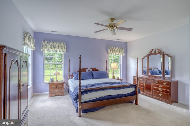 636 Poets Way, Middletown, DE 19709 - bedroom with light carpet, multiple windows, and baseboards