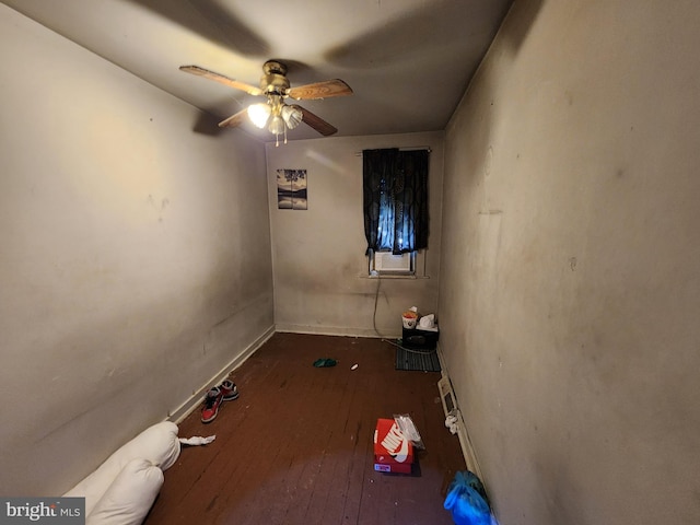 329 S Calhoun St, Baltimore, MD 21223 - unfurnished room with hardwood / wood-style floors, a ceiling fan, and baseboards