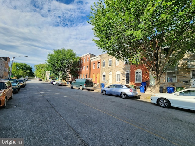 329 S Calhoun St, Baltimore, MD 21223 - view of asphalt street with street lighting, curbs, and sidewalks