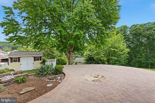 536 Dawson Trak, Hockessin, DE 19707 - view of patio featuring an outbuilding