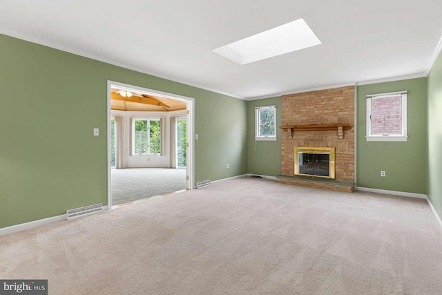 536 Dawson Trak, Hockessin, DE 19707 - unfurnished living room with ornamental molding, carpet floors, plenty of natural light, and baseboards