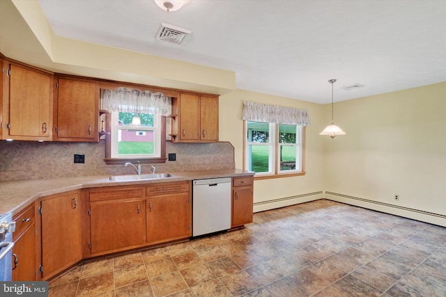 144 Ridgeview Rd, Seven Valleys, PA 17360 - kitchen featuring white dishwasher, a sink, a baseboard heating unit, tasteful backsplash, and brown cabinets