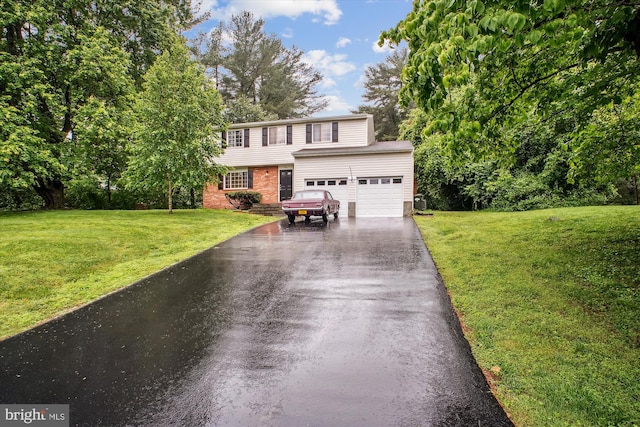 944 War Admiral St, Great Falls, VA 22066 - view of front of home with driveway, a front yard, and brick siding