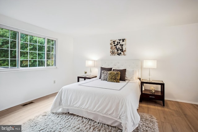 944 War Admiral St, Great Falls, VA 22066 - bedroom featuring hardwood / wood-style flooring and baseboards