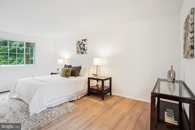 944 War Admiral St, Great Falls, VA 22066 - bedroom with light wood-style floors and baseboards