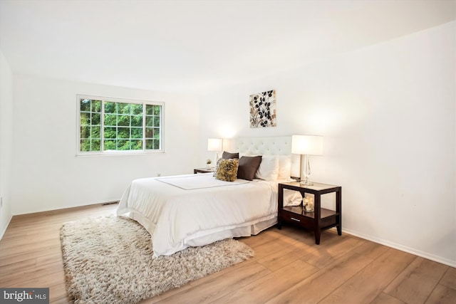944 War Admiral St, Great Falls, VA 22066 - bedroom featuring light wood finished floors and baseboards
