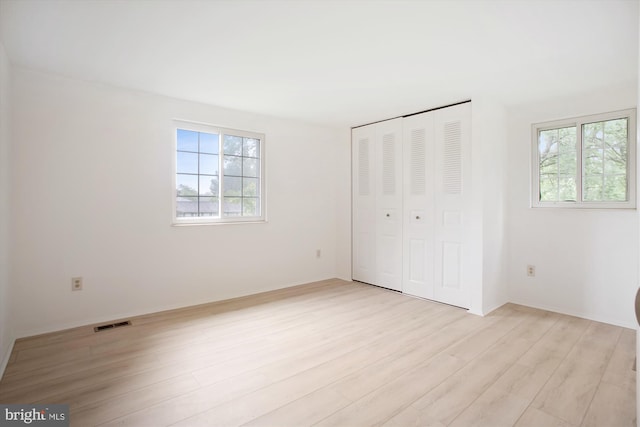 944 War Admiral St, Great Falls, VA 22066 - unfurnished bedroom with light wood-style flooring and a closet