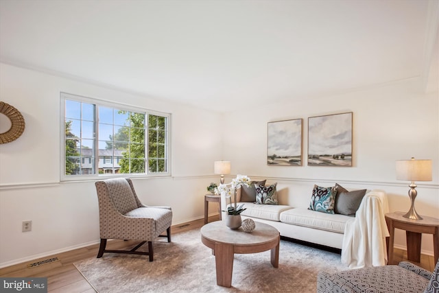 944 War Admiral St, Great Falls, VA 22066 - living area featuring wood finished floors and baseboards