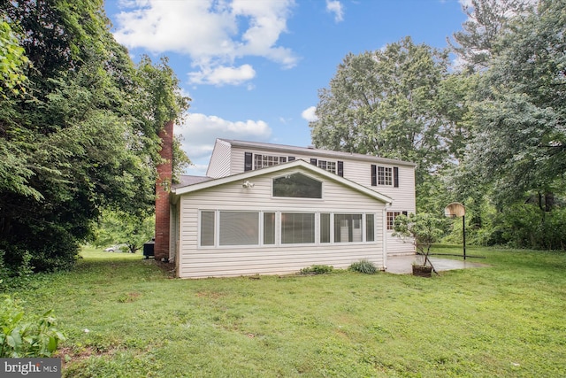 944 War Admiral St, Great Falls, VA 22066 - view of front of home with a front lawn and a patio