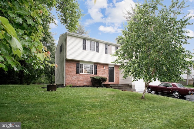 944 War Admiral St, Great Falls, VA 22066 - colonial-style house with brick siding, a front lawn, and a garage