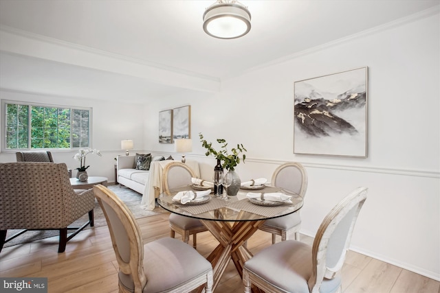 944 War Admiral St, Great Falls, VA 22066 - dining space with light wood-style flooring and ornamental molding