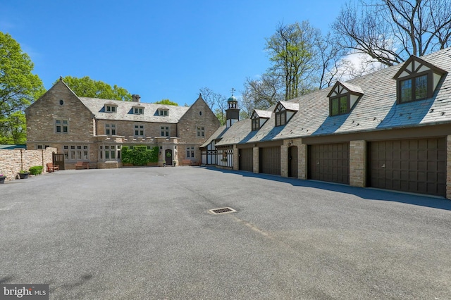 80 School House Rd, Lancaster, PA 17603 - view of asphalt road featuring community garages
