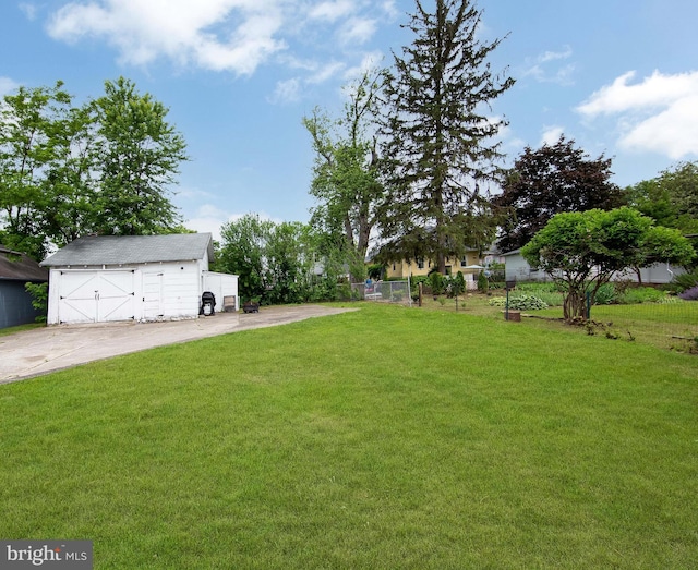 1833 W High St, Haddon Heights, NJ 08035 - view of yard with a garage and an outdoor structure