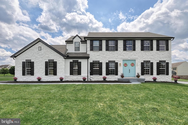 1201 Falls Grove Ln, York, PA 17404 - view of front of house featuring stone siding, a front yard, and a shingled roof