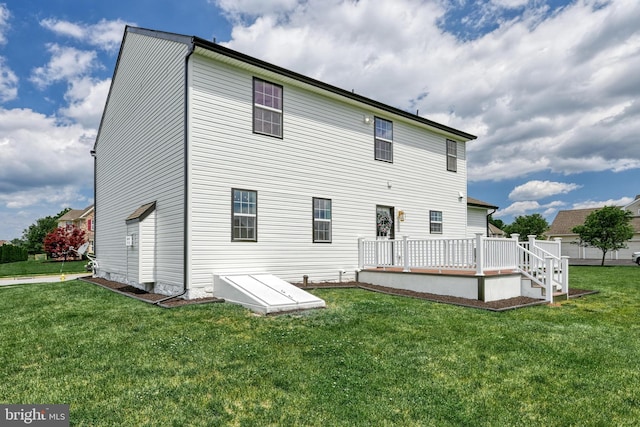 1201 Falls Grove Ln, York, PA 17404 - rear view of property with a deck and a lawn